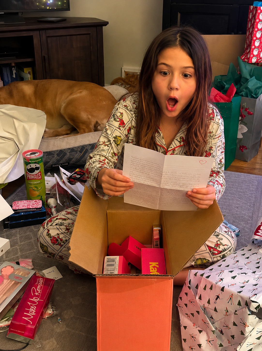 Anna reading her letter from Santa